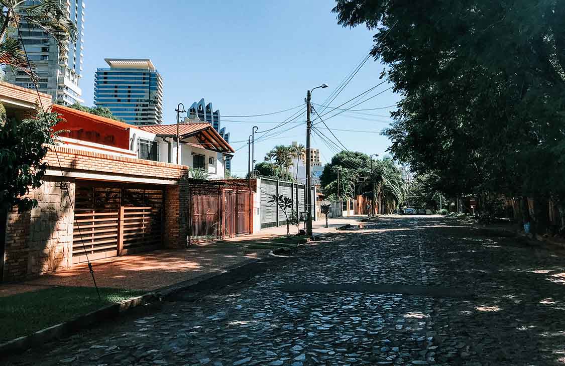 City Street in Asunción A city street in Paraguay, shaded by trees